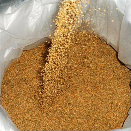 Soybean meal being poured into an export bag at the processing plant